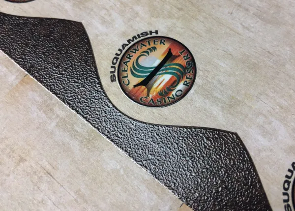 Reticulated UV coating creating a textured leather-like surface