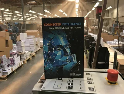 Stack of perfect-bound magazines on a table