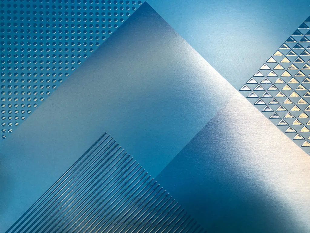 UV-coated printed materials showing glossy and matte finishes