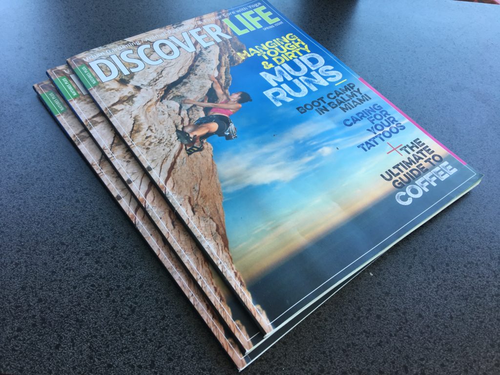 Stack of perfect-bound magazines on a table